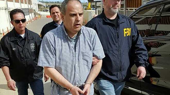Federal agents with the FBI and Customs and Border Patrol escort Robert Van Wisse at the Texas-Mexico border in Laredo as he is taken into custody in January. Van Wisse sexually assaulted and killed an Austin woman in 1983 but was brought back to the U.S. to face charges after fleeing to Mexico. FBI
