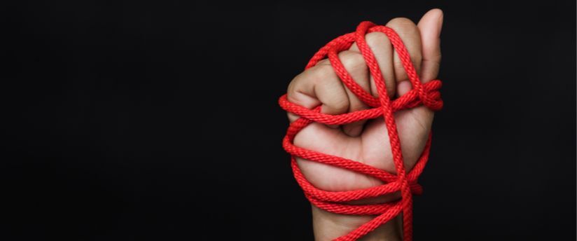 person kidnapped with red rope